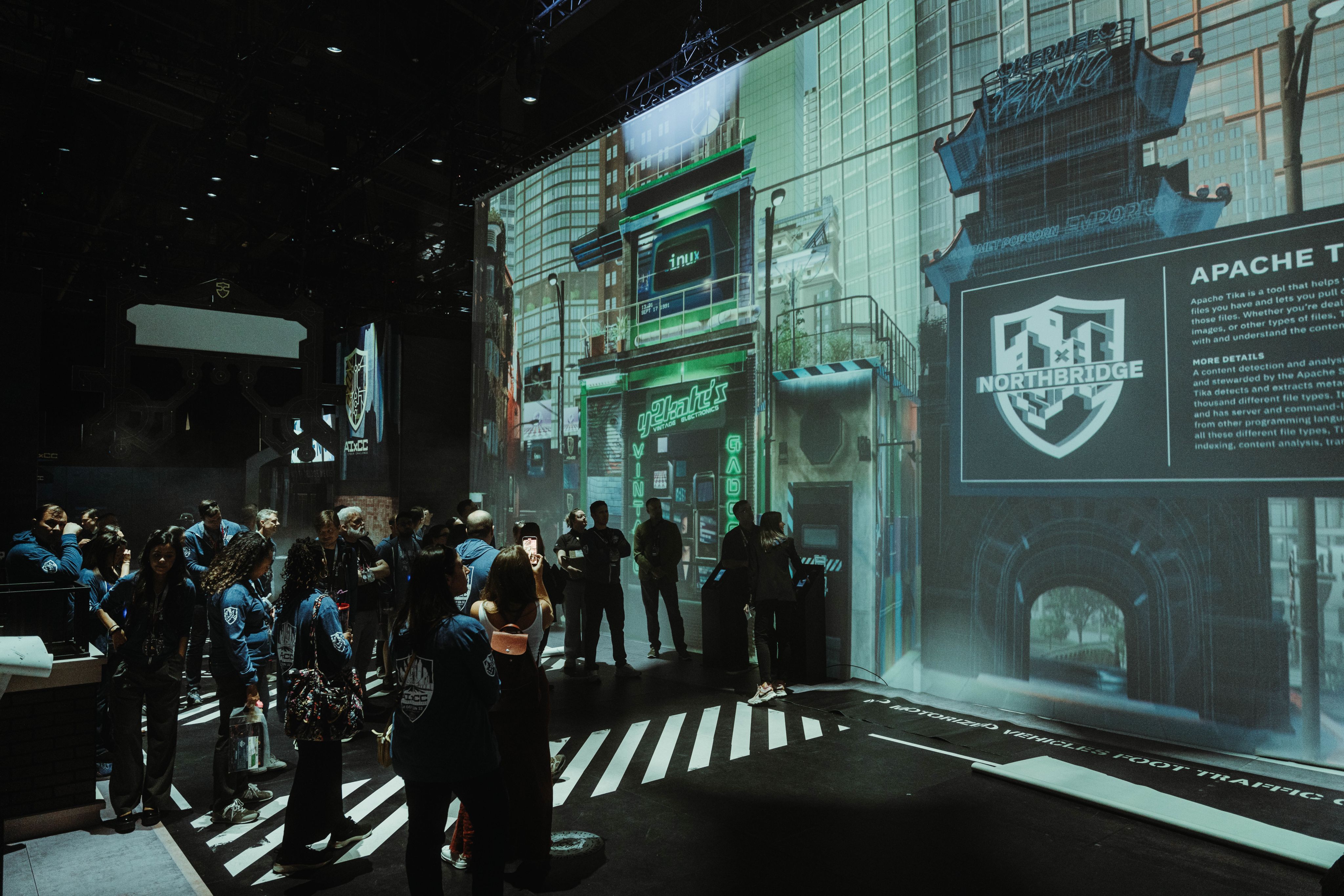 The AIxCC stage, designed to look like a near-future connected city